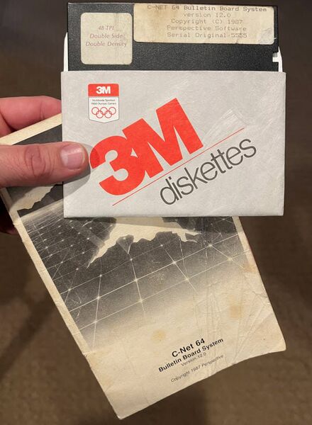 File:C-Net 12.0 disk and manual.jpg